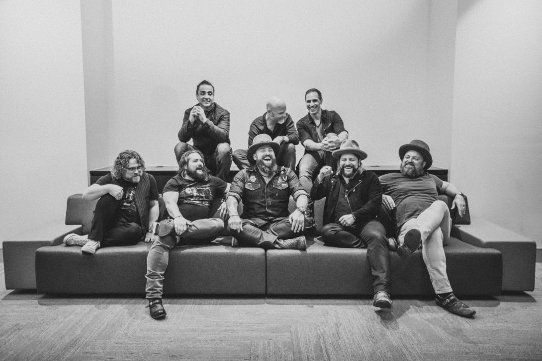 Zac Brown Band sharing a candid backstage moment